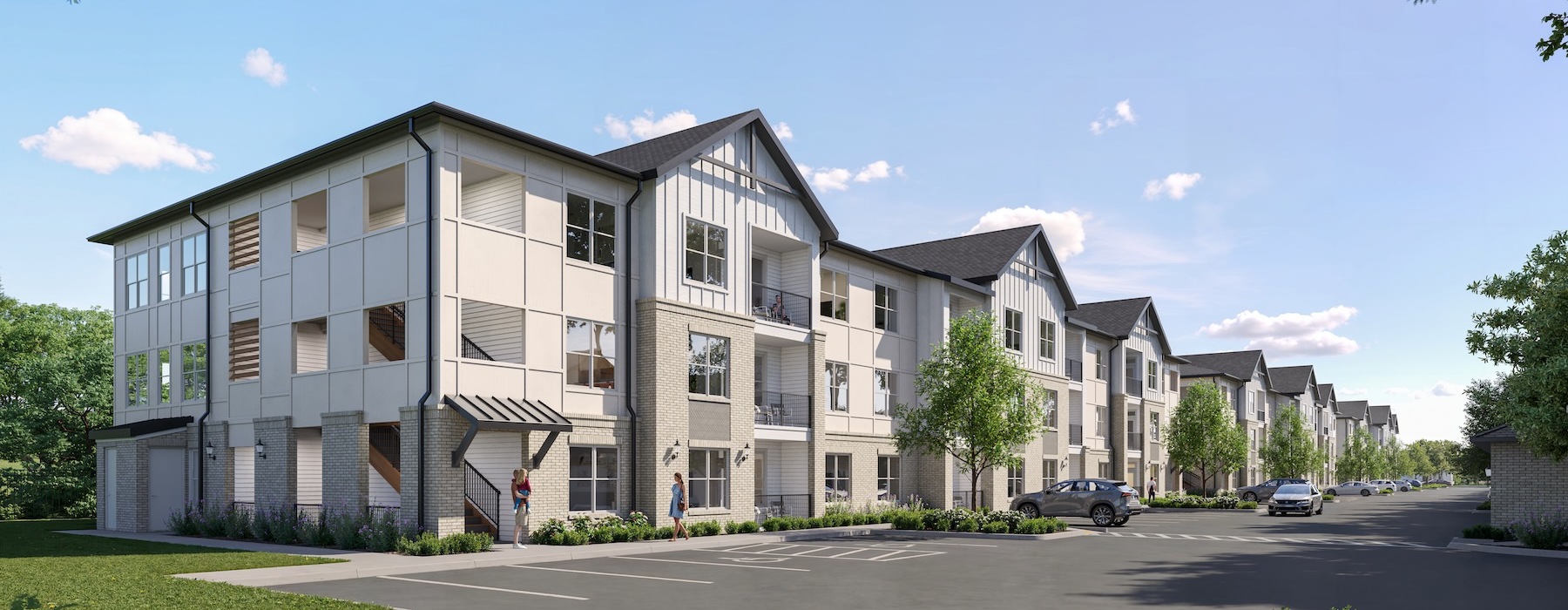 an apartment building with a parking lot